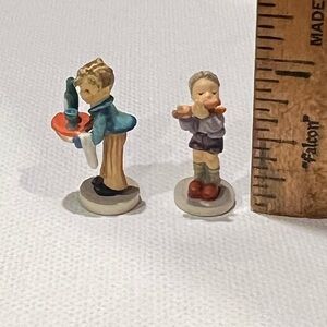 Two Goebel Hummel Miniatures
Boy with Flute and Waiter w/Wine